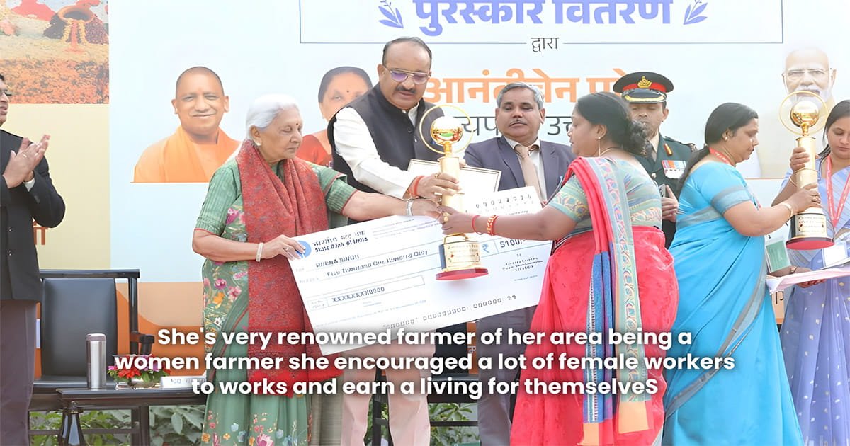 Reena Singh receiving an award for excellence in polyhouse farming